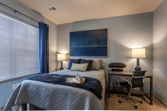 Furnished bedroom decorated with blue decor